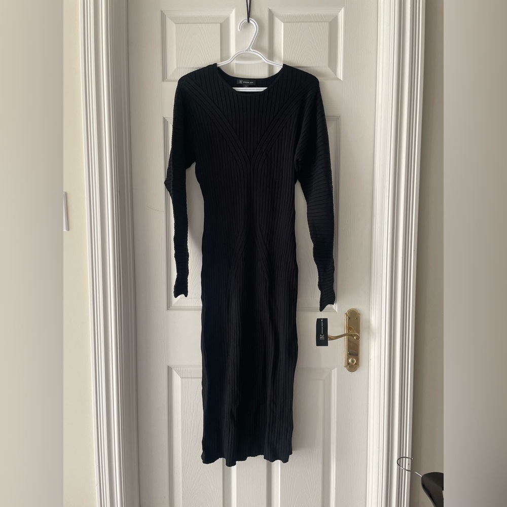 Woman’s long sleeved fitted dress